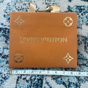 Authentic Louis Vuitton paper bag.